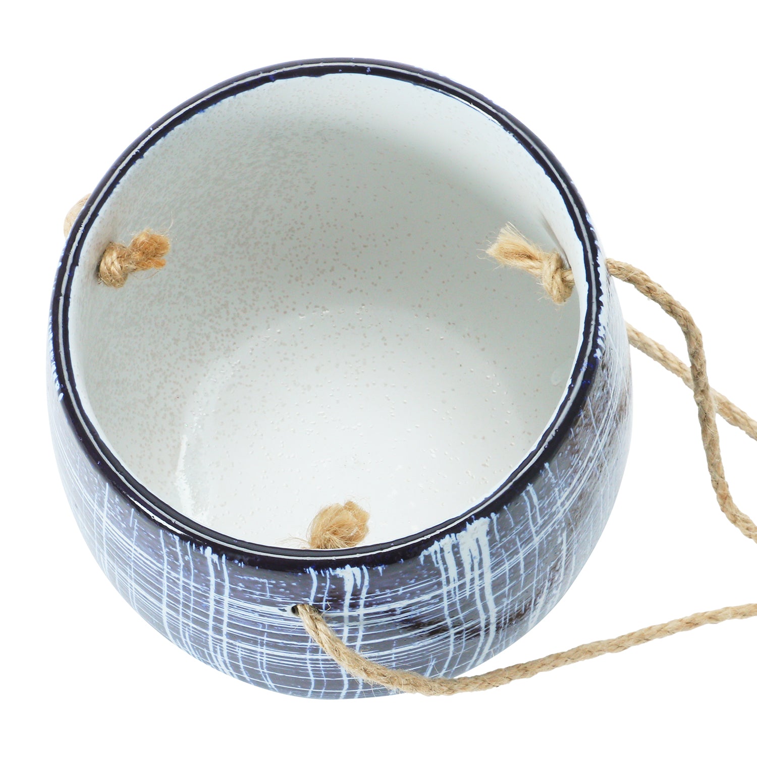 A dark blue stoneware hanging planter with white hatching patterns and a natural jute hanger.